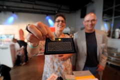 Dr. Carmen Meuser (Fraunhofer ENAS) demonstrating a printed flexible battery on technical textile with LED connection at Exhibition Hall at Wear It Festival. on 19-20 June 2018 at the Kulturbrauerei Berlin - (c) Wear It Berlin / Michael Wittig, Berlin