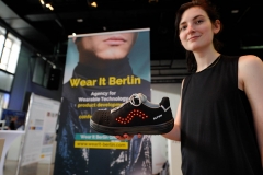 Wear It Berlin Creative Technologist Nathalie Krüger demoing a smart shoe at Exhibition Hall at the Wear It Festival - The Conference on Wearables, fashion tech, smart clothing and consumer innovation on 19-20 June 2018 at the Kulturbrauerei Berlin - (c) Wear It Berlin / Michael Wittig, Berlin